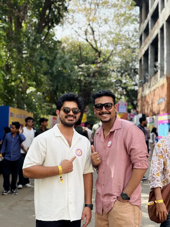 At a festival, nominee badges on