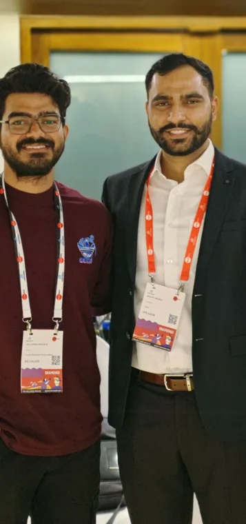 With a speaker at a conference
