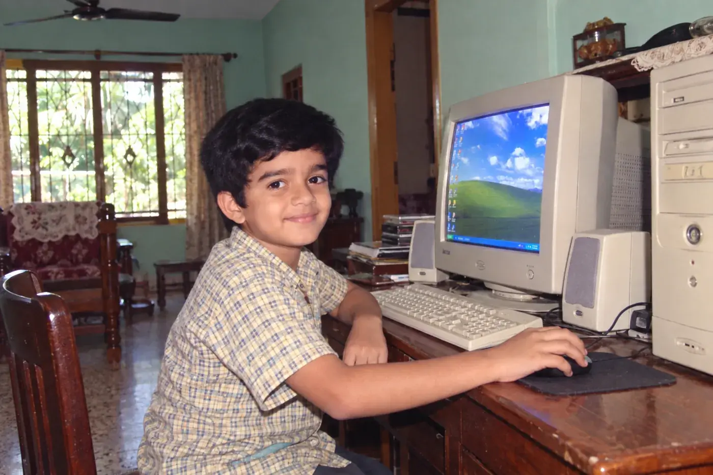 At the computer, age 10
