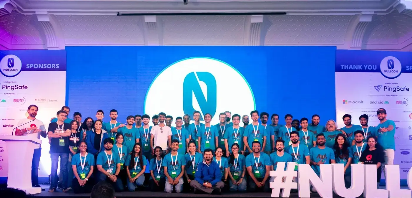 The Nullcon Con-troller team on stage, in blue t-shirts